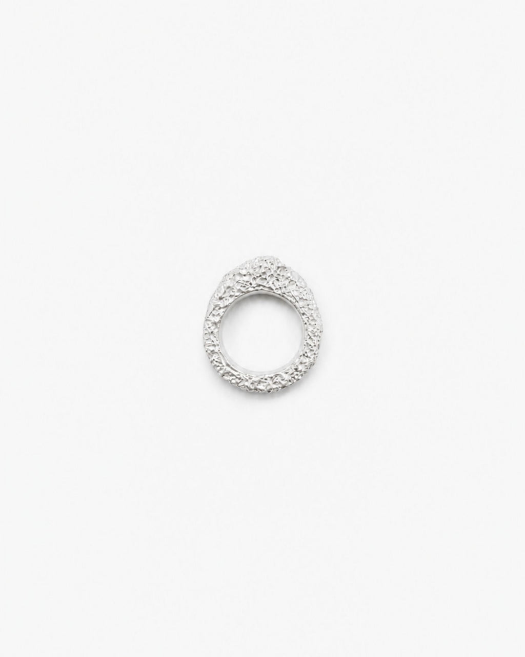 Silver ring with lava texture design on a white background
