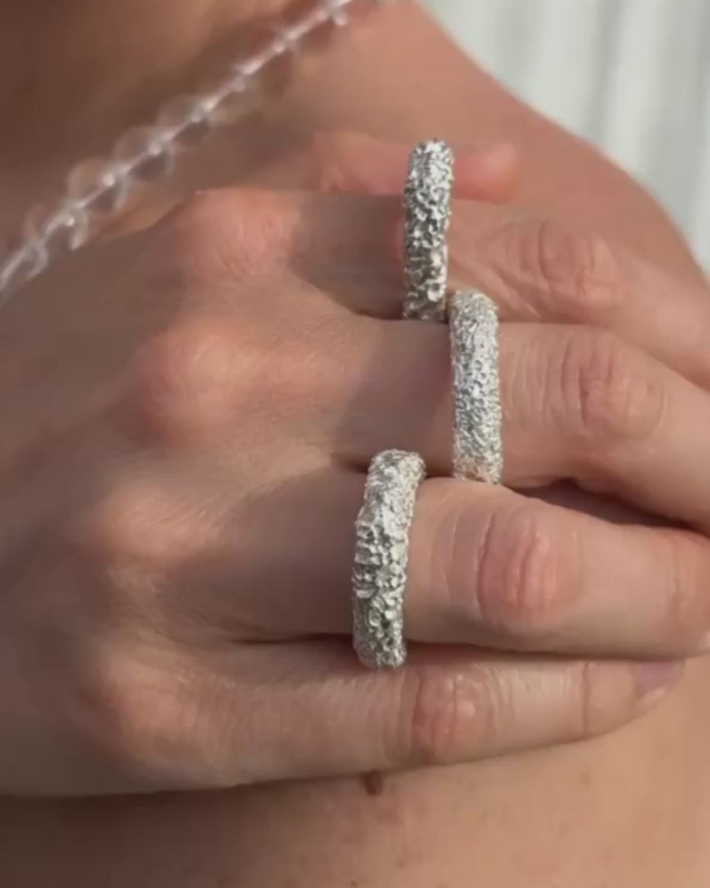 Silver rings with lava textured design